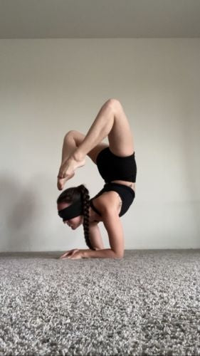 Person wearing a headband during yoga